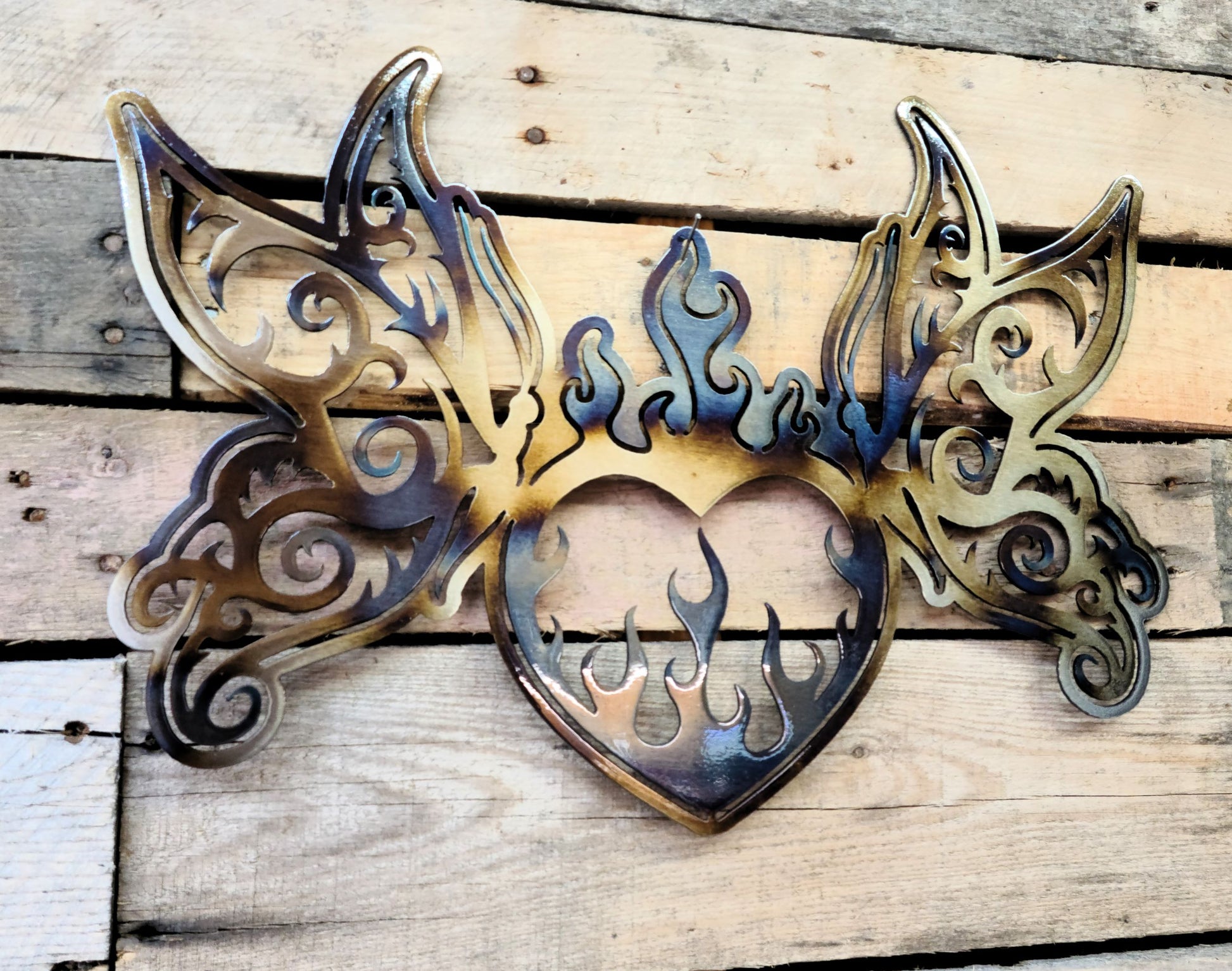 Flame heart with butterfly wings