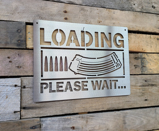 Loading Please Wait gun sign