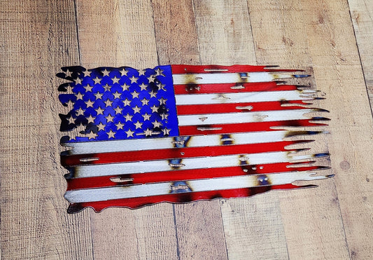 Tattered, distressed, battle worn American Flag